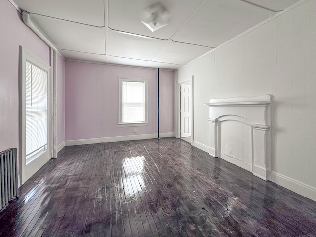 39 Tanner Ave, Norwich, CT 06360 - unfurnished living room with hardwood / wood-style floors, radiator heating unit, and baseboards