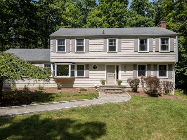 34 Longmeadows Rd, Wilton, CT 06897 - colonial inspired home featuring roof with shingles, a chimney, and a front yard