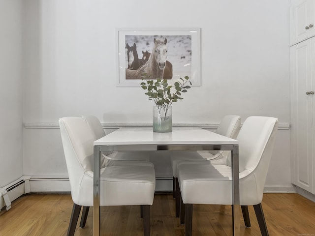 34 Longmeadows Rd, Wilton, CT 06897 - dining area with baseboard heating and light wood-style flooring