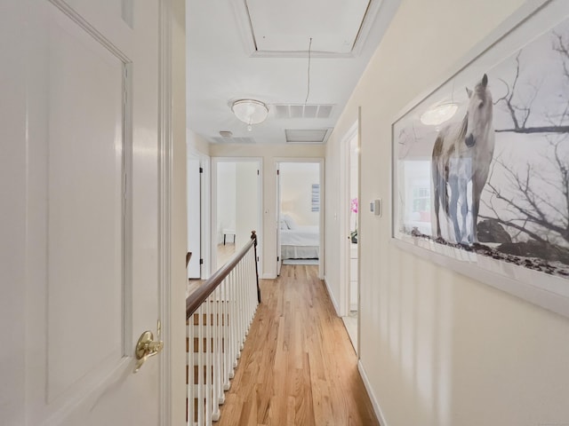 34 Longmeadows Rd, Wilton, CT 06897 - corridor with attic access, light wood finished floors, and visible vents