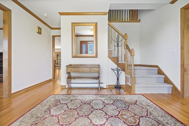 4 Walnut Ridge Rd, New Fairfield, CT 06812 - staircase with baseboards, crown molding, wood finished floors, and baseboard heating