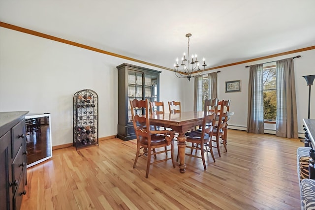 4 Walnut Ridge Rd, New Fairfield, CT 06812 - dining area featuring light wood-style floors, crown molding, wine cooler, and a chandelier