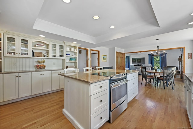 4 Walnut Ridge Rd, New Fairfield, CT 06812 - kitchen featuring stainless steel electric stove, a raised ceiling, and open shelves