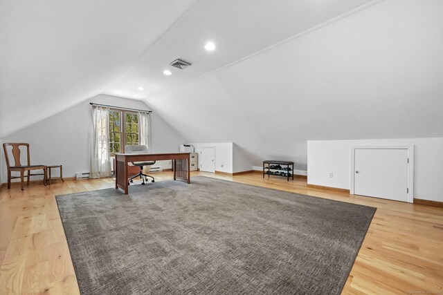 4 Walnut Ridge Rd, New Fairfield, CT 06812 - office featuring visible vents, lofted ceiling, baseboards, light wood-type flooring, and a baseboard radiator