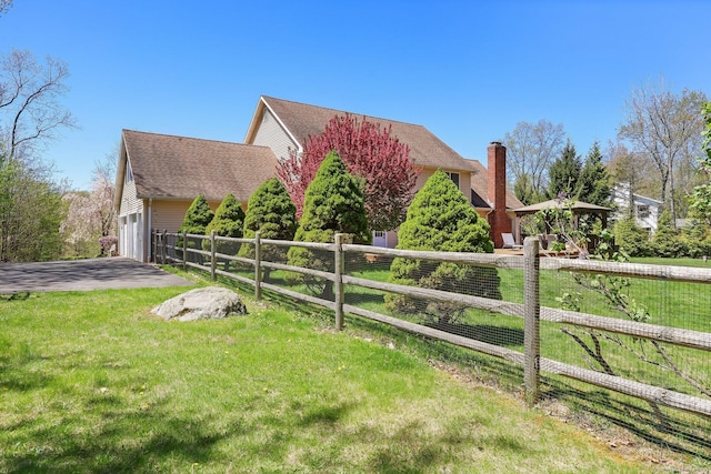 4 Walnut Ridge Rd, New Fairfield, CT 06812 - view of property exterior with a yard, an attached garage, fence, and driveway