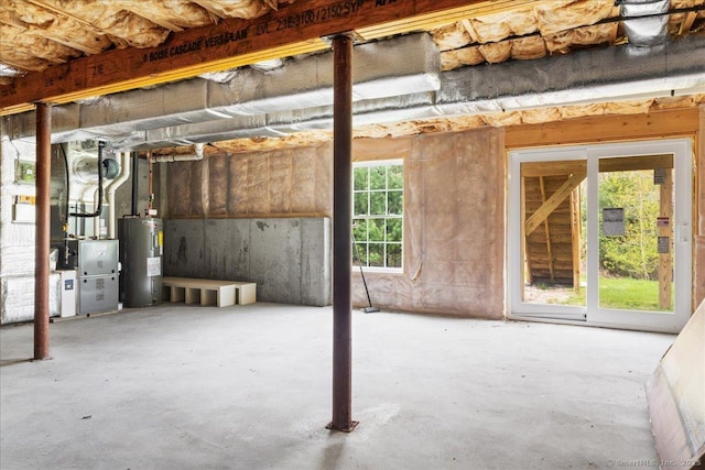 below grade area featuring electric water heater