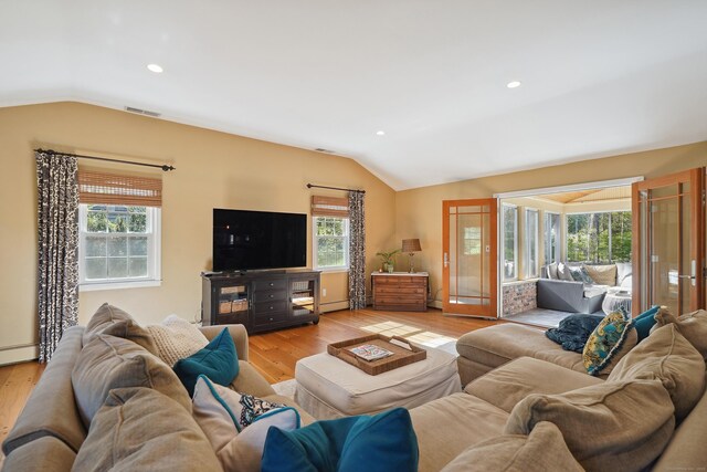 50 Carriage Dr S, Stamford, CT 06902 - living area featuring lofted ceiling, plenty of natural light, light wood-type flooring, and recessed lighting