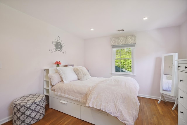 50 Carriage Dr S, Stamford, CT 06902 - bedroom with wood finished floors, recessed lighting, and baseboards