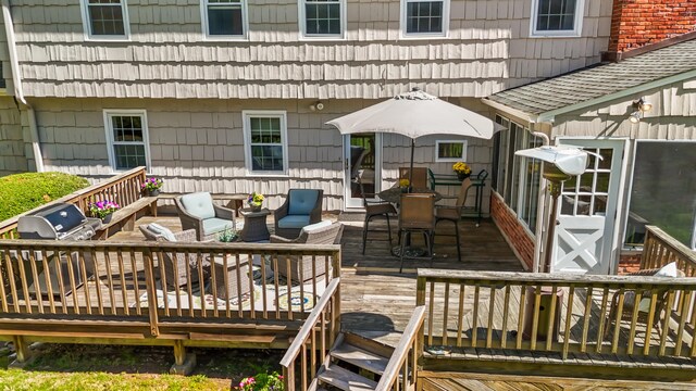 50 Carriage Dr S, Stamford, CT 06902 - wooden terrace with an outdoor living space