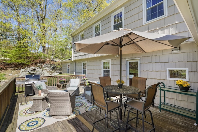 50 Carriage Dr S, Stamford, CT 06902 - wooden terrace with outdoor dining area and area for grilling