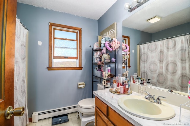 full bath with vanity, a textured ceiling, a baseboard heating unit, and toilet