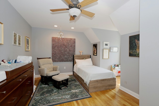 bedroom with light wood-style floors, baseboards, a ceiling fan, and recessed lighting