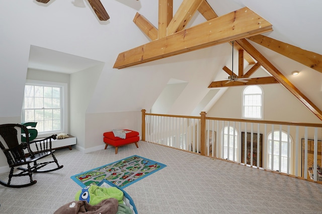 playroom featuring high vaulted ceiling, ceiling fan, carpet, and beam ceiling