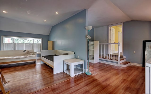 115 W Avon Rd, Farmington, CT 06085 - bedroom featuring baseboards, vaulted ceiling, recessed lighting, and wood finished floors