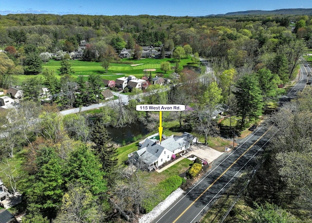 115 W Avon Rd, Farmington, CT 06085 - drone / aerial view featuring a wooded view