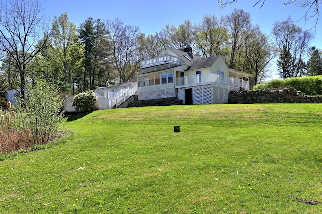 115 W Avon Rd, Farmington, CT 06085 - exterior space featuring stairs, a chimney, a yard, and a deck