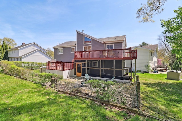 46 Fairway Grn, Fairfield, CT 06825 - rear view of house with a lawn and a wooden deck