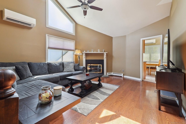 46 Fairway Grn, Fairfield, CT 06825 - living room featuring a baseboard radiator, a glass covered fireplace, ceiling fan, and an AC wall unit