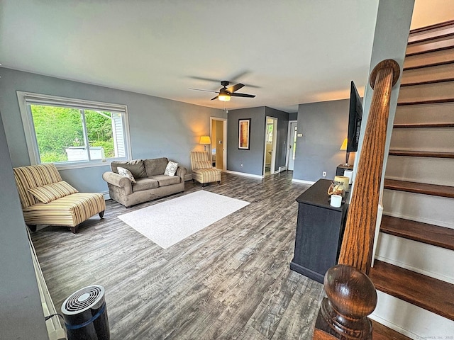 46 Fairway Grn, Fairfield, CT 06825 - living area with baseboards, stairs, ceiling fan, and dark wood-type flooring
