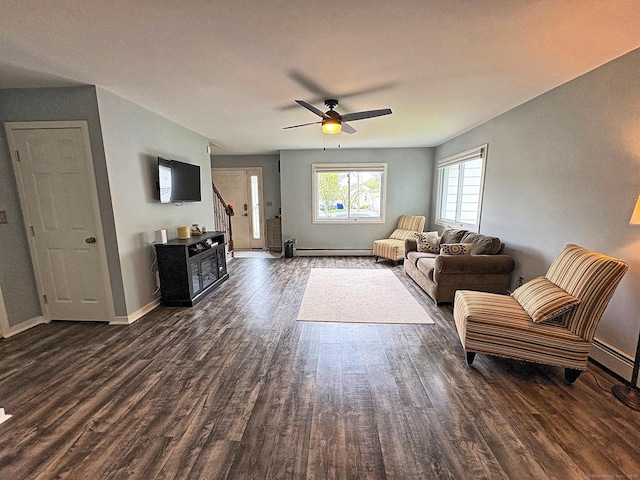 46 Fairway Grn, Fairfield, CT 06825 - living area with baseboards, baseboard heating, dark wood-style flooring, a baseboard heating unit, and ceiling fan