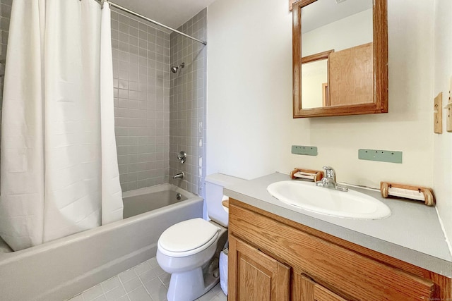 full bathroom with vanity, toilet, tile patterned floors, and shower / tub combo with curtain