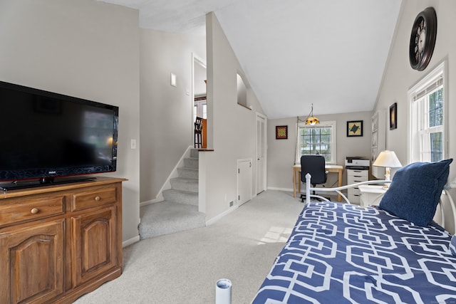 living room with stairway, light colored carpet, lofted ceiling, and baseboards