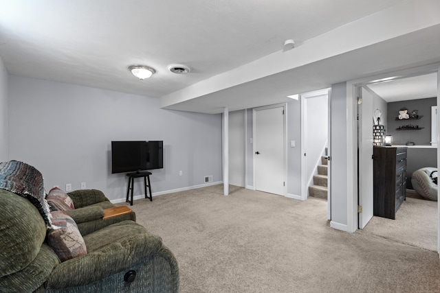 living room featuring light colored carpet, stairs, baseboards, and visible vents