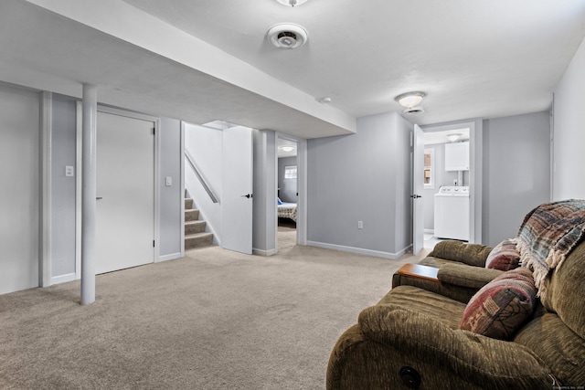 carpeted living room featuring washer / clothes dryer, stairs, and baseboards