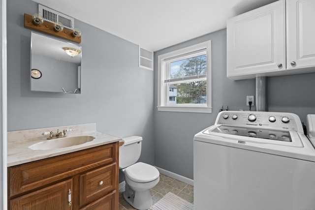 bathroom featuring toilet, baseboards, visible vents, tile patterned flooring, and vanity