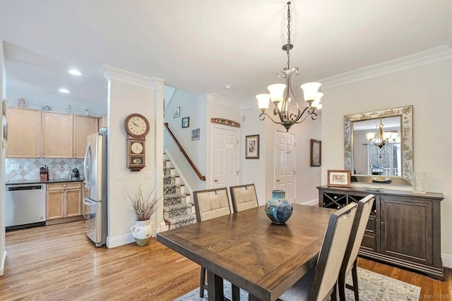 44 Woodcrest Ln Unit 44, Danbury, CT 06810 - dining space featuring a chandelier, light wood finished floors, ornamental molding, stairway, and recessed lighting