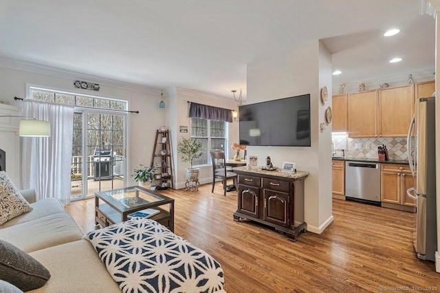 44 Woodcrest Ln Unit 44, Danbury, CT 06810 - living room featuring light wood-style flooring, ornamental molding, and recessed lighting