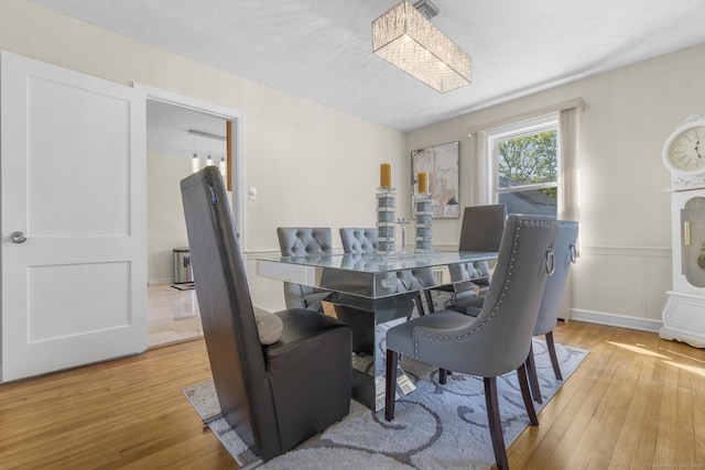 dining room featuring light wood finished floors