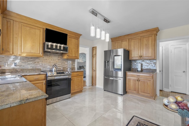 kitchen featuring backsplash, pendant lighting, appliances with stainless steel finishes, light stone counters, and marble finish floor
