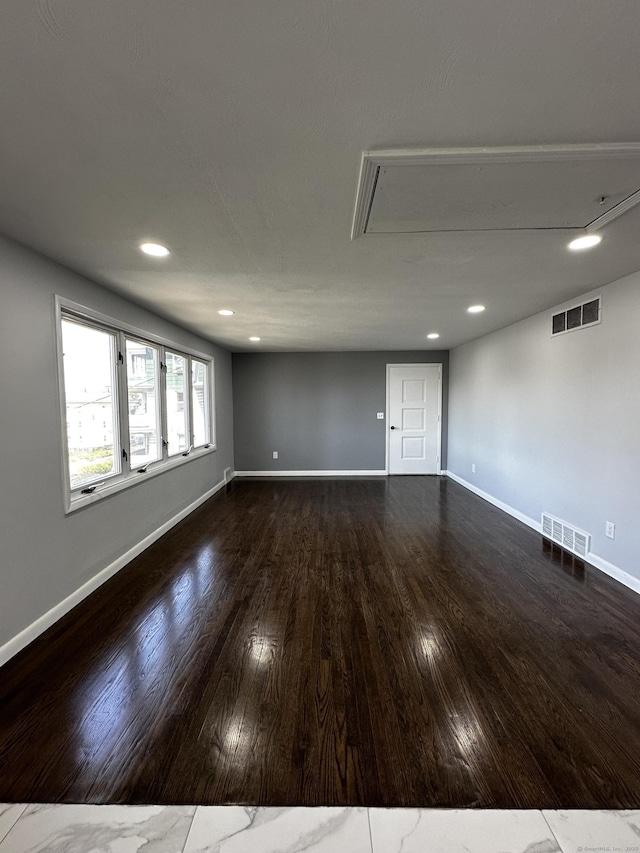 163 Sylvan Ave, Waterbury, CT 06706 - empty room featuring attic access, dark wood finished floors, and recessed lighting