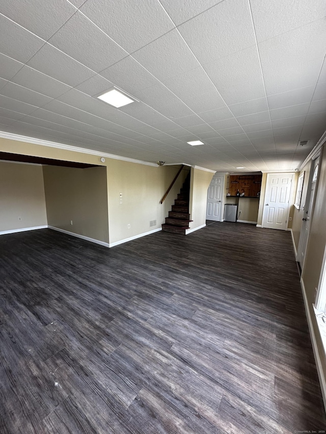 163 Sylvan Ave, Waterbury, CT 06706 - finished below grade area with ornamental molding, stairway, and dark wood finished floors