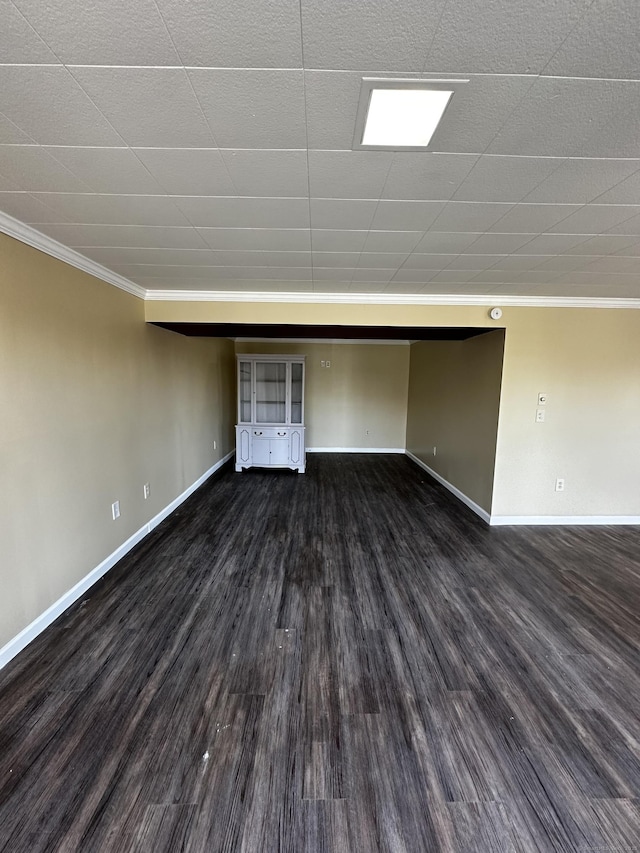 163 Sylvan Ave, Waterbury, CT 06706 - below grade area with ornamental molding and dark wood-type flooring