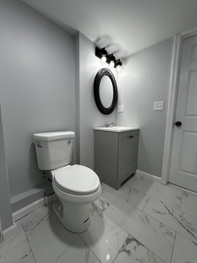 163 Sylvan Ave, Waterbury, CT 06706 - bathroom featuring marble look tiles and vanity
