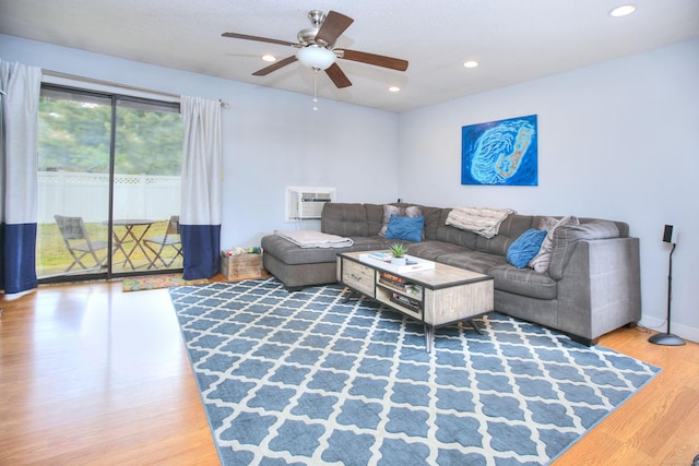 116 Hill St Unit 23, Milford, CT 06460 - living area with recessed lighting, a ceiling fan, wood finished floors, and a wall mounted air conditioner