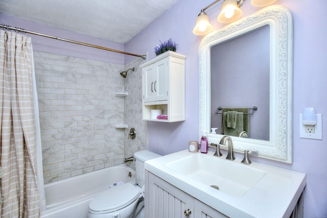 116 Hill St Unit 23, Milford, CT 06460 - bathroom featuring vanity, shower / bath combo, toilet, and a textured ceiling