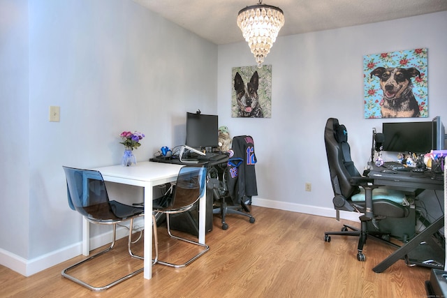 116 Hill St Unit 23, Milford, CT 06460 - office featuring an inviting chandelier, baseboards, and light wood-style flooring