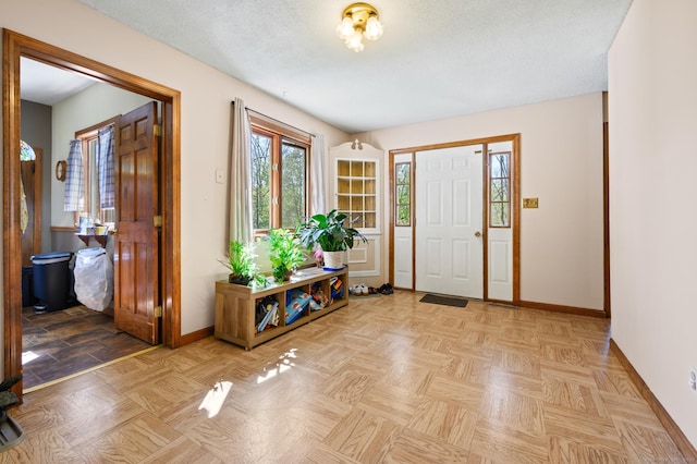 entrance foyer with baseboards