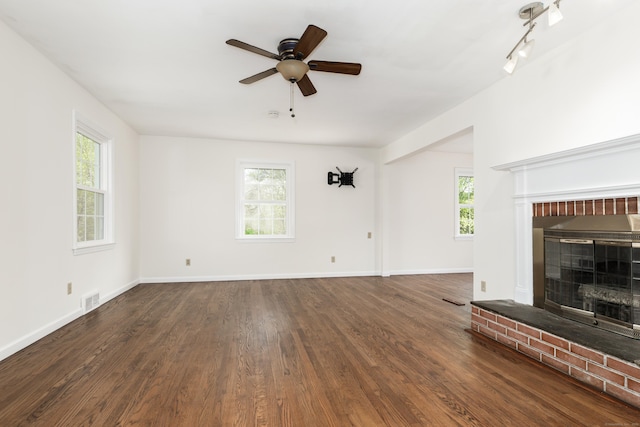 123 Hilltop Dr, Trumbull, CT 06611 - unfurnished living room with a brick fireplace, visible vents, and a wealth of natural light