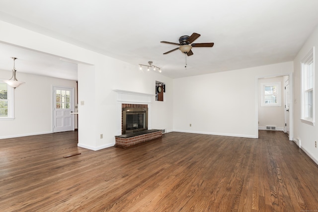 123 Hilltop Dr, Trumbull, CT 06611 - unfurnished living room featuring a brick fireplace, a ceiling fan, wood finished floors, and visible vents