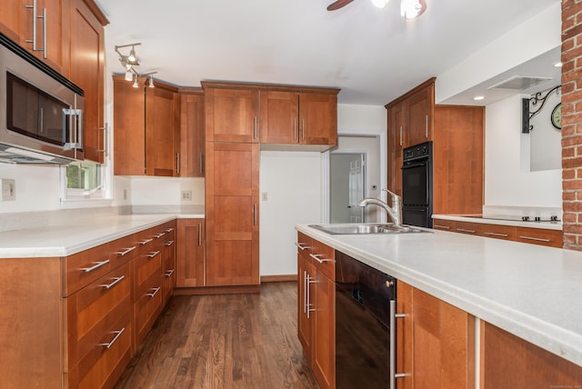 123 Hilltop Dr, Trumbull, CT 06611 - kitchen featuring brown cabinets, a sink, black appliances, and dark wood-type flooring