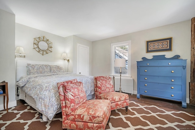 149 Limekiln Rd, Redding, CT 06896 - bedroom with radiator, wood finished floors, and baseboards
