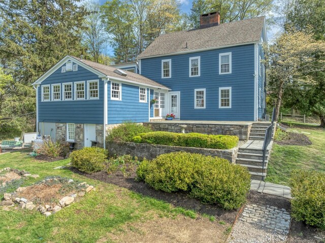 149 Limekiln Rd, Redding, CT 06896 - back of house with a chimney and roof with shingles