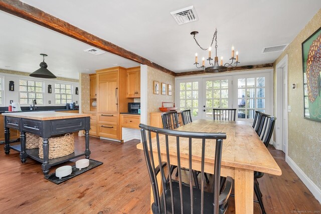 149 Limekiln Rd, Redding, CT 06896 - dining room with a chandelier, hardwood / wood-style flooring, french doors, baseboards, and beamed ceiling