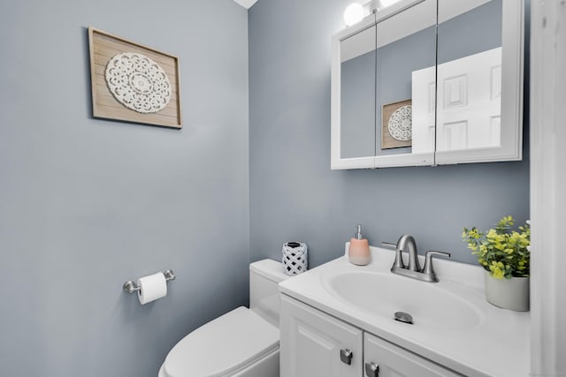 half bath with toilet and vanity