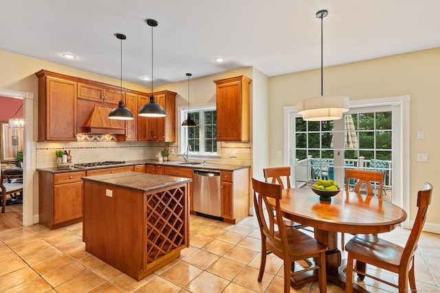 41 Madison Way S, Windsor, CT 06074 - kitchen with stainless steel appliances, custom exhaust hood, dark countertops, a kitchen island, and decorative backsplash