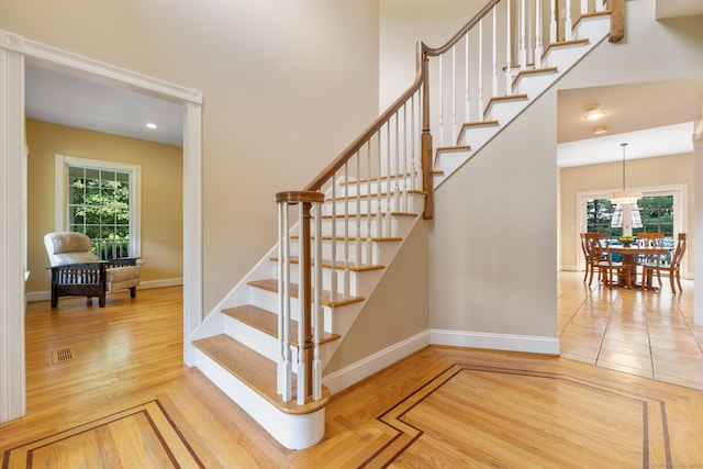 41 Madison Way S, Windsor, CT 06074 - stairs with baseboards, wood finished floors, and a towering ceiling